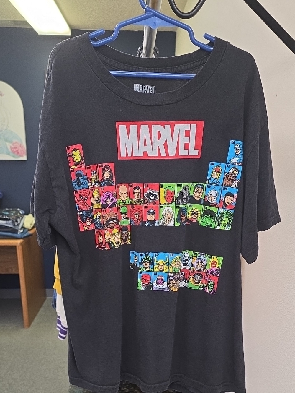 Marvel Black Tee with White Interior Logo and Blue Hanger Accent